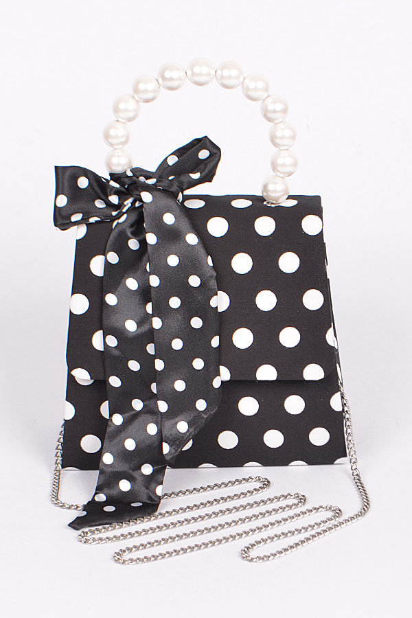 black and white polka dot clutch bag